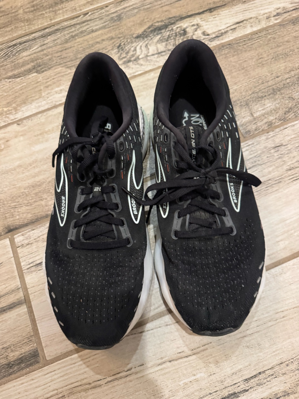 Brooks women’s Black Athletic Running Shoes with White Accents